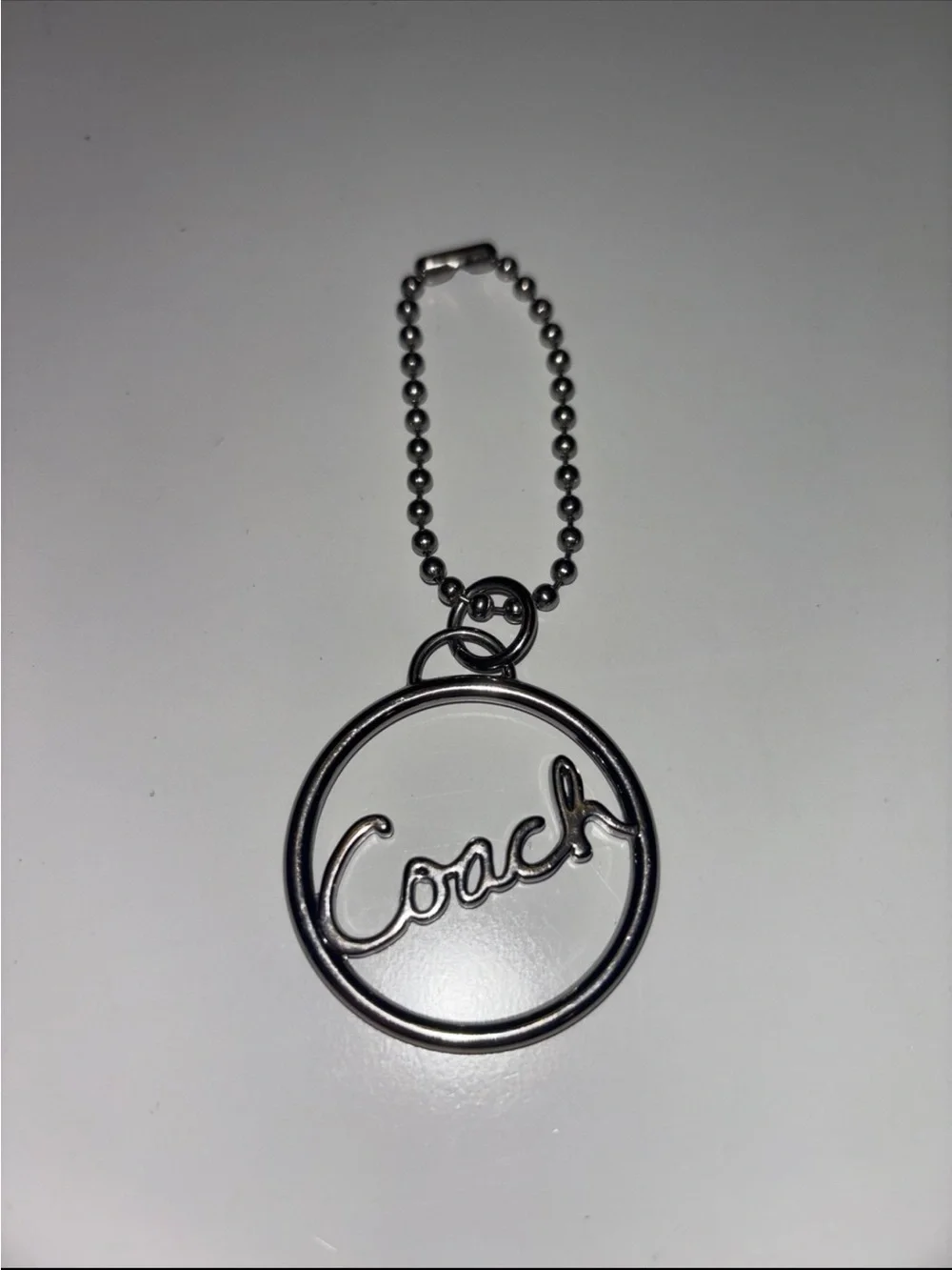 Coach Silver Script Circle Keychain